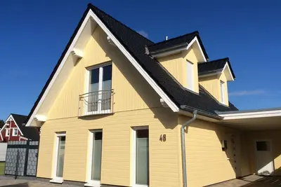 Image de Villa Lakoste, maison de vacances de luxe avec sauna, cheminée, bain bien-être et grand jardin