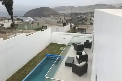 Image de L'Angelita - Casa vista al mar - piscina y jacuzzi