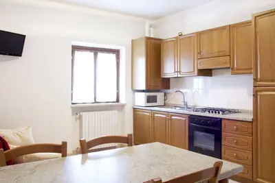 Image de Joli appartement dans une maison de vacances avec Wifi, piscine, Tv, vue panoramique et parking