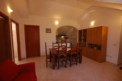 Image de Il Libeccio A3 Appartement de 2 chambres avec accès au jardin et à la piscine