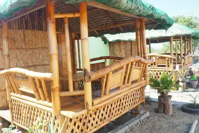 Image de Mini Resort flambant neuf dans un cadre calme et verdoyant. environnement de plage! Bahay Kubo's