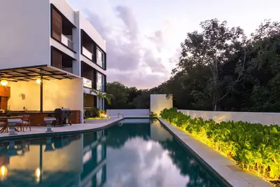 Appartement de luxe avec jacuzzi, accès à la plage privée de la plage vierge.