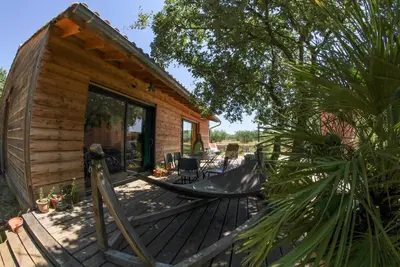 Image de Maison en bois avec grande terrasse et jolie vue