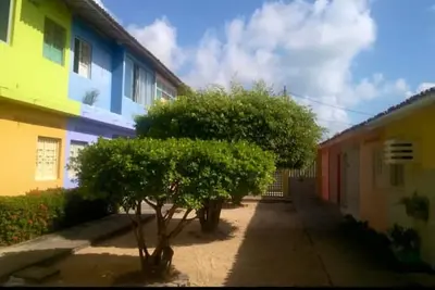 Image de Maison à Prive Arco Íris à 3 minutes de la plage d'Enseada dos Corais.