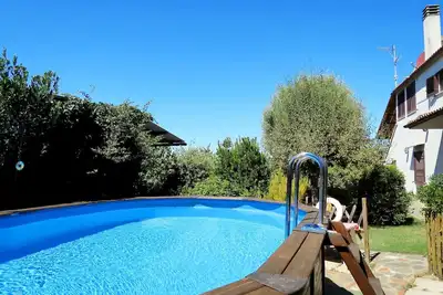 Image de Merveilleuse maison de vacances privée avec Wifi, piscine, Tv, terrasse, animaux admis et parking