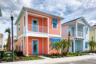 Image de Coral Cottage! Nouveau sur Vrbo / Ha! Commodités de l'hôtel + nettoyage quotidien + près de Disney World!