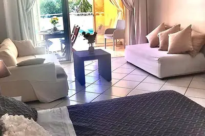 Image de Suite De Luxe SUPÉRIEURE Avec Terrasse ouvrant sur la plus belle plage