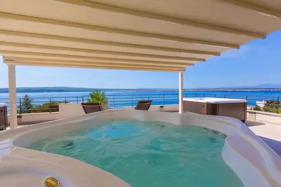 Appartement de vacances près de la plage avec jacuzzi