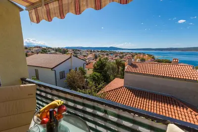 Image de Appartement de vacances avec climatisation et vue sur la mer