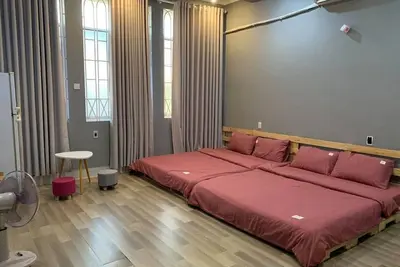 Image de Homestay Sunrise 6 Chambres PRÈS De La Plage ARRIÈRE