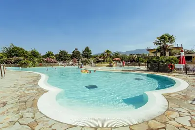 Image de Joli appartement pour 6 personnes avec bain à remous, piscine, Wifi, climatisation, Tv et terrasse