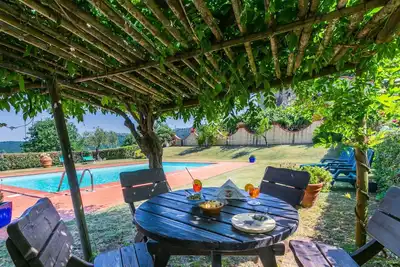 Image de Confortable appartement avec Wifi, piscine, climatisation, Tv, patio et animaux admis