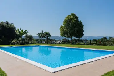 Image de Bel appartement dans une maison de vacances avec piscine, Wifi, Tv, terrasse et parking