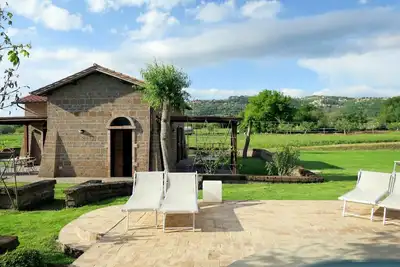 Image de Joli appartement dans une maison de vacances avec Wifi, piscine, Tv, patio, vue panoramique, parking