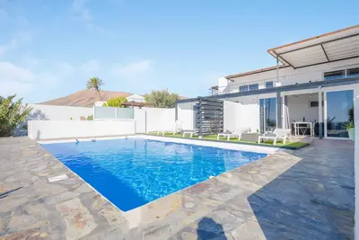Image de Appartement de vacances \"Casa Amanecer 2\" avec vue sur la mer, jardin et piscine