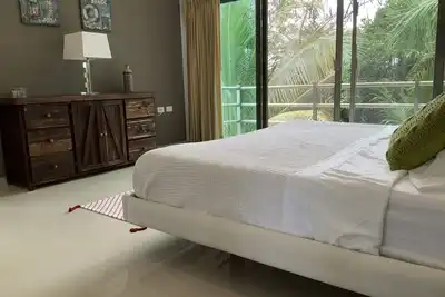 Image de Magnifique condo - 3 minutes à pied de la plage