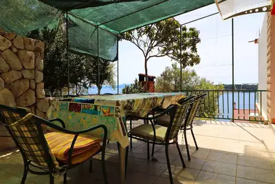 Image de Appartement de trois chambres avec la terrasse et la vue sur le mer Prizba, Korcula (A-18165-a)