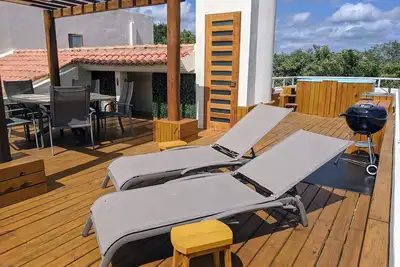 Image de Lujoso Penthouse duplex + rooftop full equipado rodeado de Selva y Mar
