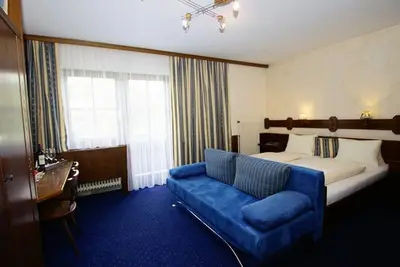 Image de Chambre triple avec douche / Wc, balcon - Heidi, pension