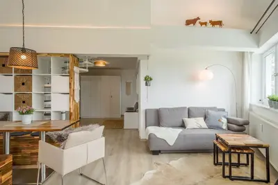 Image de Appartement confortable \"Heimelig im Allgäu\" avec vue sur les montagnes, Wi-Fi et terrasse