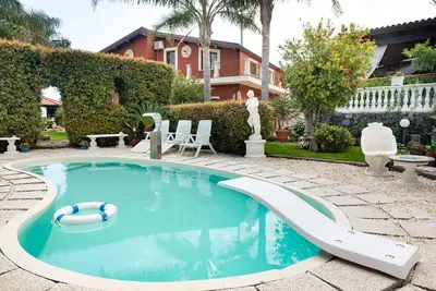 Image de Appartement \"Ai confini dell'Etna 2\" avec piscine partagée, vue imprenable, Wi-Fi et climatisation.