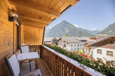 Image de Appartement confortable \"Kornblume - Mesnerhof\" avec vue sur les montagnes, Wi-Fi, balcon et jardin
