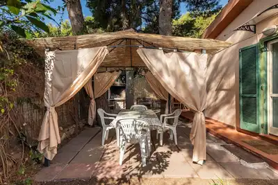 Image de Maison de vacances \"Villetta Simius\" avec Wi-Fi, Jardin et Terrasse