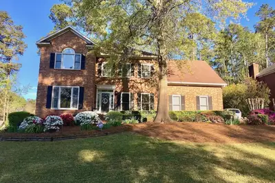 Image de Retraite de la semaine des maîtres 2020 avec véranda et piscine