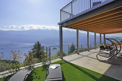 Image de Appartement de vacances Maison du Pralonc - Lago avec vue sur le lac/les montagnes et jardin