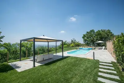 Image de Confortable appartement dans une maison de vacances avec Wifi, piscine, climatisation, Tv, patio