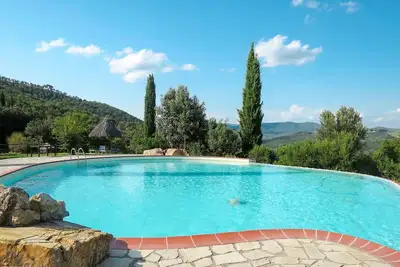 Image de Appartement dans une maison de vacances avec climatisation, piscine, patio, vue panoramique