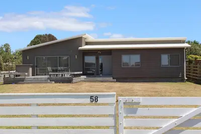 Image de Maison de vacances Tokerau Beach entièrement clôturée
