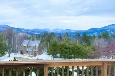 Image de Belle maison de ville avec vue sur la montagne, Wi-Fi gratuit et foyer au bois