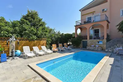 Image de Appartement de vacances avec piscine commune et climatisation