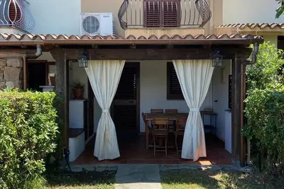 Image de Charmante Villetta La Perla avec Wi-Fi, jardin, terrasse et vue sur la mer ; parking disponible.