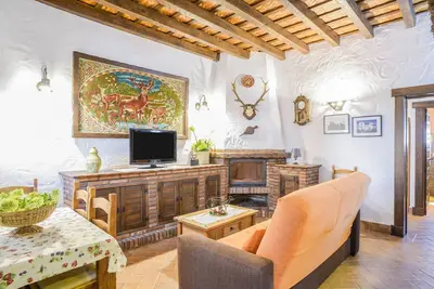 Image de Appartement \"El Nogal\" dans la résidence \"Apartamentos Rurales la Cartuja\" avec piscine