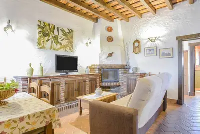 Image de Appartement \"El Olivo\" dans la résidence \"Apartamentos Rurales la Cartuja\" avec piscine