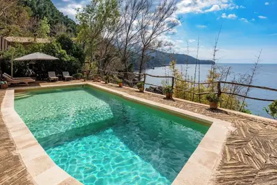 Image de Superbe villa surplombant la mer - Villa \"Es Racó d'Alconàsser\"