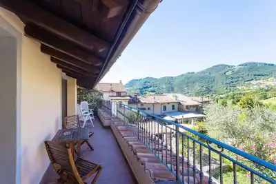 Image de Appartement 'Casa Rita App 1' avec terrasse, jardin et Wi-Fi partagés.