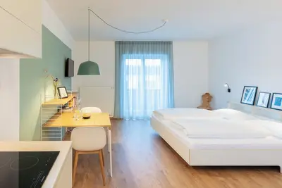 Image de Appartement moderne \"Hus Apartment - Nr. 1\" avec balcon, jardin et Wi-Fi
