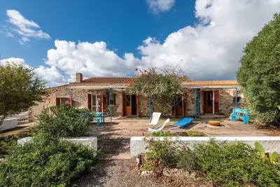 Image de Maison de vacances de charme \"Dimora tipica Carlofortina\" avec vue sur la mer et les montagnes