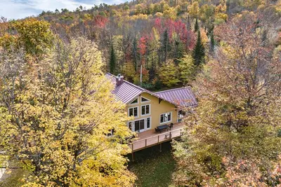 Image de Chalet Tremblant avec Spa et accès au lac Supérieur #301372