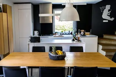 Image de Appartement de 2 étages avec un joli jardin