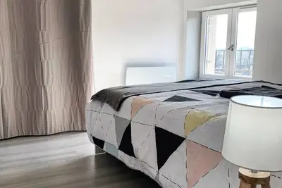Image de Appartement  chaleureux avec deux grandes chambres