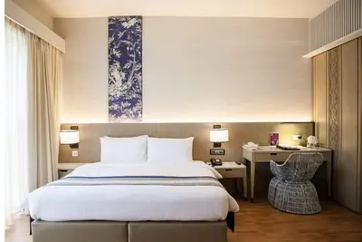 Image de Chambre Deluxe, vue partielle sur la mer # 05