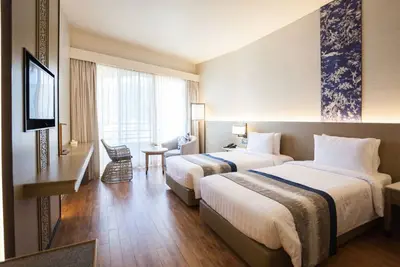 Image de Chambre Deluxe # 15, vue partielle sur la mer