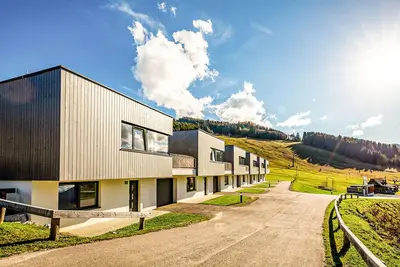 Image de Ferienhaus im sonnigen Resort