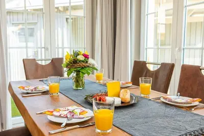 Image de Mine Heimat Twee, modern thatched apartment for 4 people in Zingst with sauna/fireplace