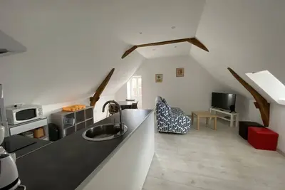 Image de Appartement confortable proche des Thermes avec lave-vaisselle et options de location de linge