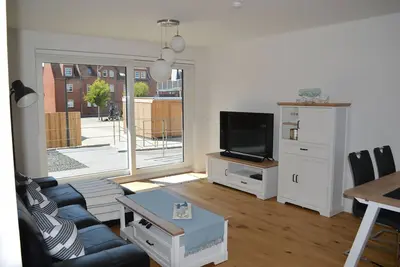 Image de Ferienwohnung Theos Garten